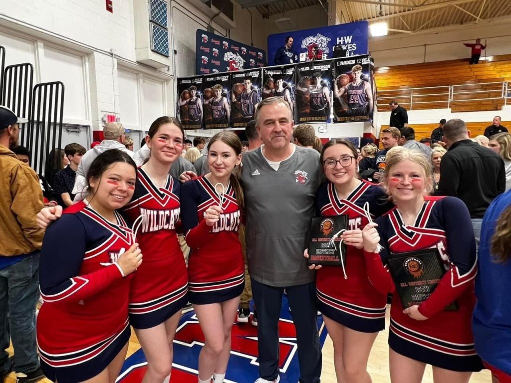 2023 Coach Johnson and Cheerleaders after District Win (ECHS)