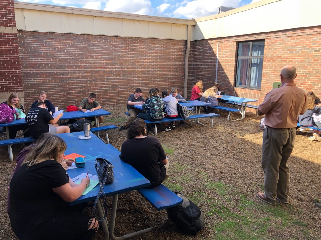 2023 Jimmy White utilizing the “outdoor classroom” with 8th grade writing students (ECMS)